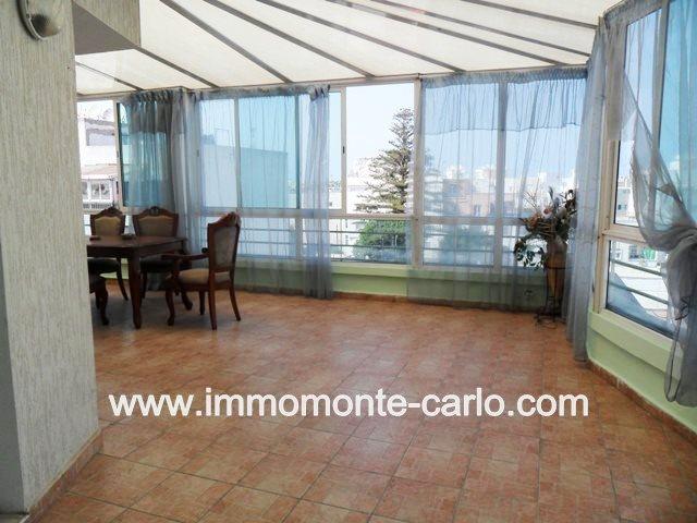 Photo bel appartement meublé avec une grande terrasse couverte à Agdal image 1/4