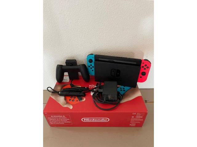Console Nintendo switch avec accessoires + jeux