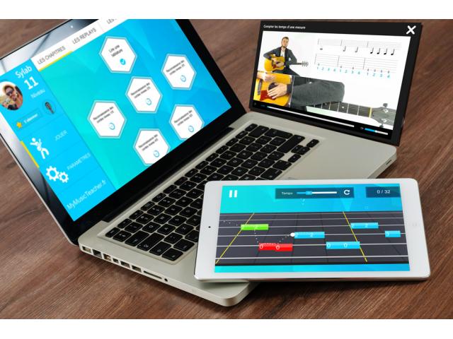 Cours de guitare ludique sur internet avec correction automatique et interface de jeu en 3D MyMusicT