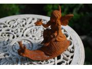 Annonce ELFE,FEE EN FONTE ASSISE SUR UN ESCARGOT TENANT UN OISEAU