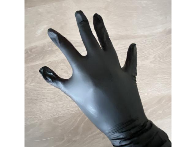 Gants noirs jetables pour le fist