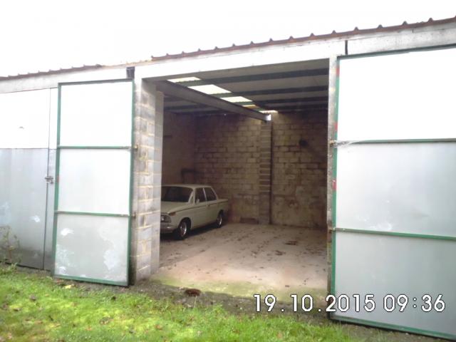 Garage double 47 m², toiture isolée, libre 01.11.2015