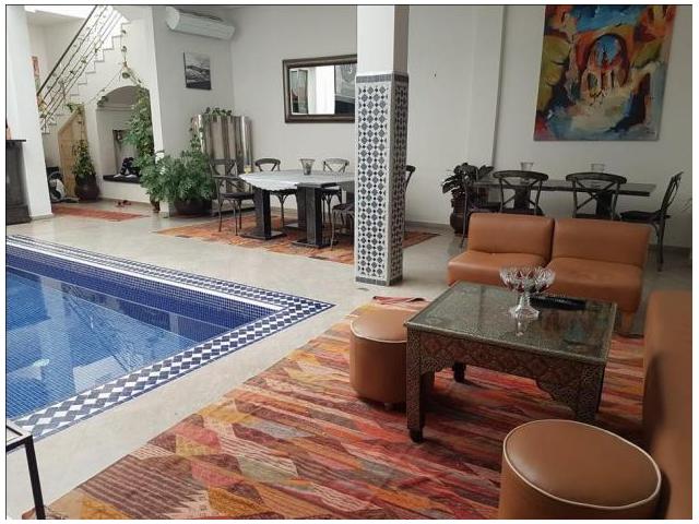 Photo Joli Riad meuble vc piscine a Medina image 1/6