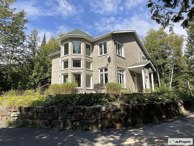 Maison de rêve au bord du lac à St-Alphonse-Rodriguez (Quebec)