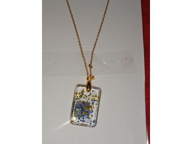 pendentif avec collier 50cm d'oré