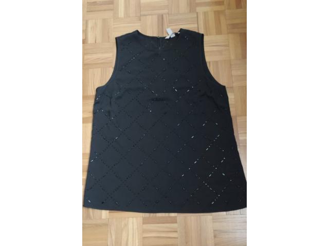 Top noir avec brillants H&M Comme neuf