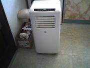Annonce un  climatiseur   mobile   fait   du  froid   en  bon    état