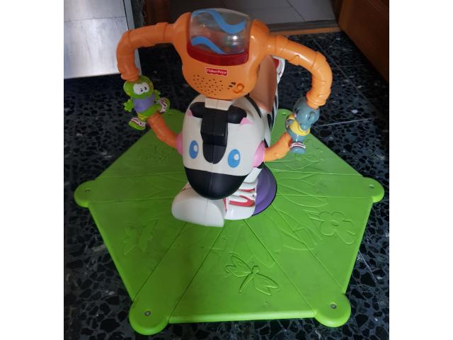 Zèbre Tourni Rebond Fisher Price.
