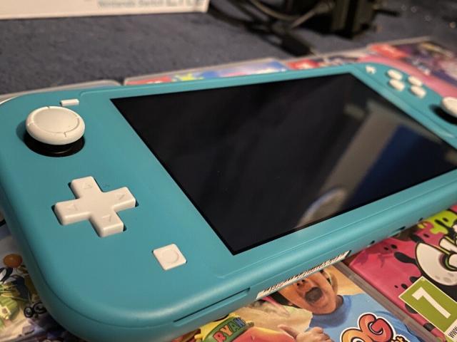 Photo Excellent état ! Nintendo Switch Lite Système Portable - Turquoise image 2/5