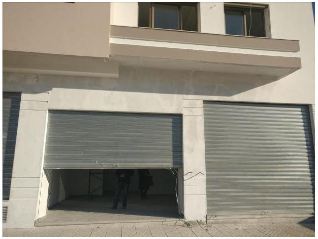 Photo INVESTISSEZ à LONG TERME  MAGASINS BOUSKOURA image 2/6