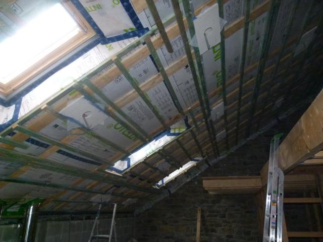 Photo isolation par insufflation d'ouate de cellulose toiture mur plancher image 2/5