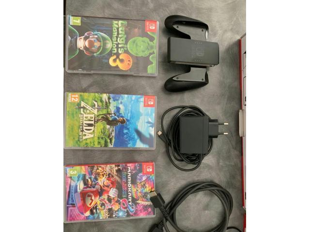 Photo Nintendo switch + 3 jeux image 2/3