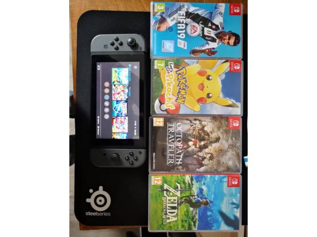 Photo Nintendo Switch + Jeux + Manette filaire officielle image 2/4