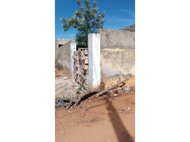 Photo Terrain avec un batiment en construction à vendre à vendre à Somone Sénégal image 2/4