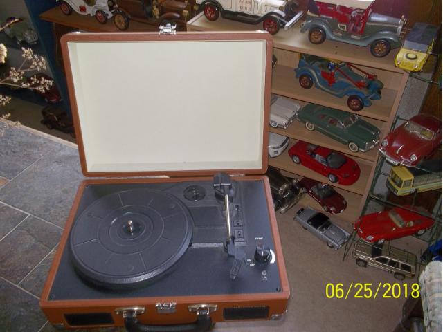 Photo vend   un  tourne   disques image 2/2