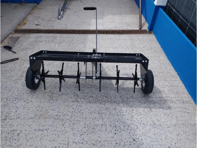 Photo A vendre scarificateur tracté image 3/3