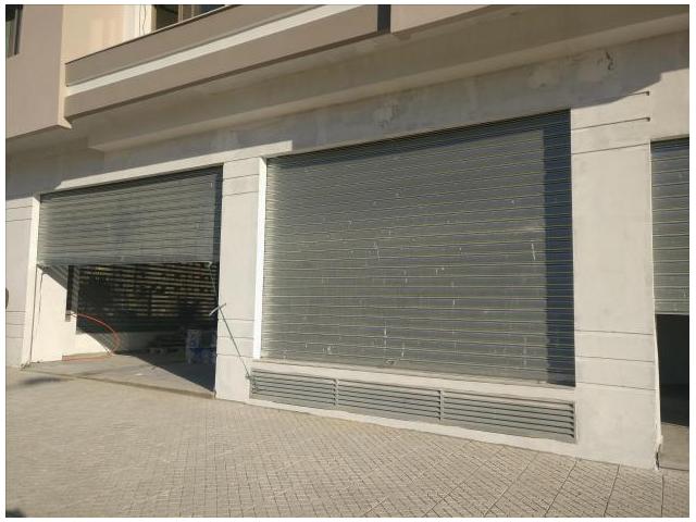 Photo INVESTISSEZ à LONG TERME  MAGASINS BOUSKOURA image 3/6