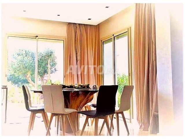 Photo Apprt RDJ 163m2 PRESTIGIA GOLF BOUSKOURA jardin image 4/6