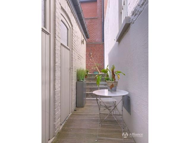 Photo Immeuble de rapport avec surface commerciale à usage de salon de coiffure, 4 kots, studio à vendre c image 4/6