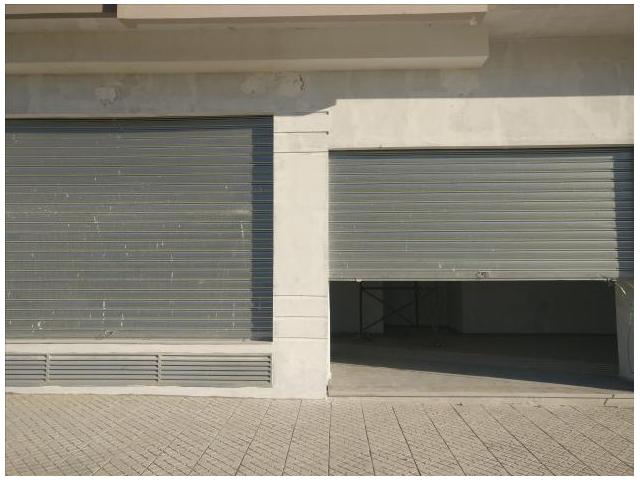 Photo INVESTISSEZ à LONG TERME  MAGASINS BOUSKOURA image 4/6