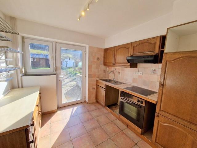 Photo Bouillon : maison mitoyenne, jardin, garage, 2 chambres, bureau. image 5/6