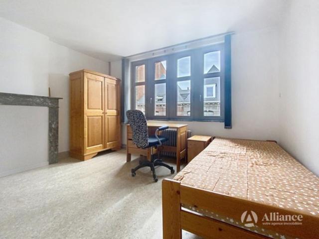 Photo Immeuble de rapport avec surface commerciale à usage de salon de coiffure, 4 kots, studio à vendre c image 5/6