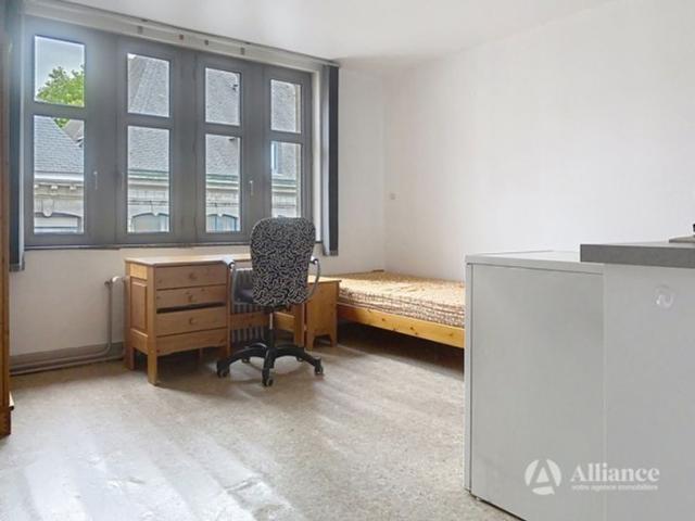 Photo Immeuble de rapport avec surface commerciale à usage de salon de coiffure, 4 kots, studio à vendre c image 6/6